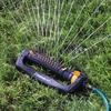 image:imageMelnor 65202AMZ CrossStream Turbo Oscillating Sprinkler 4000 Sq Ft Coverage TwinTouch Width amp Range Control InfinityDrive Turbo Motor Black Orange